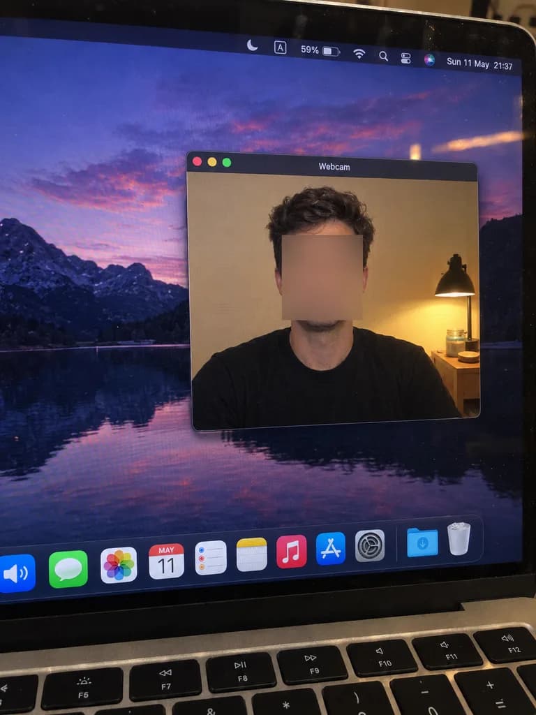 Smartphone Photo of Laptop Webcam Window