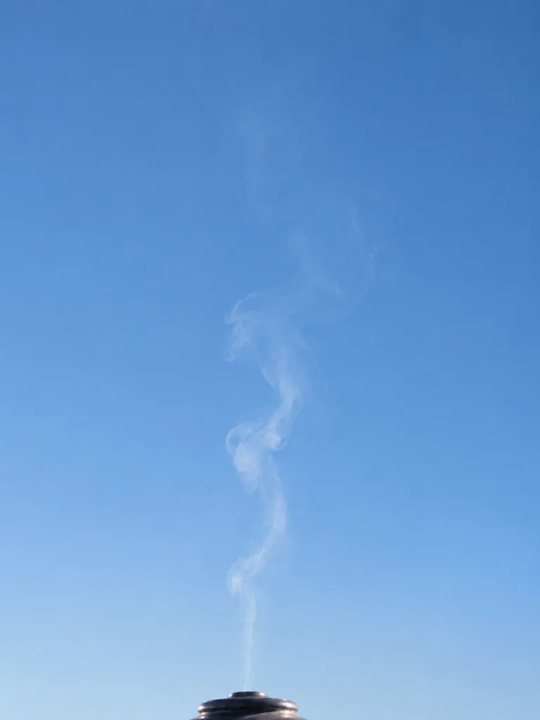 Cremation Smoke Dissolving in Sky