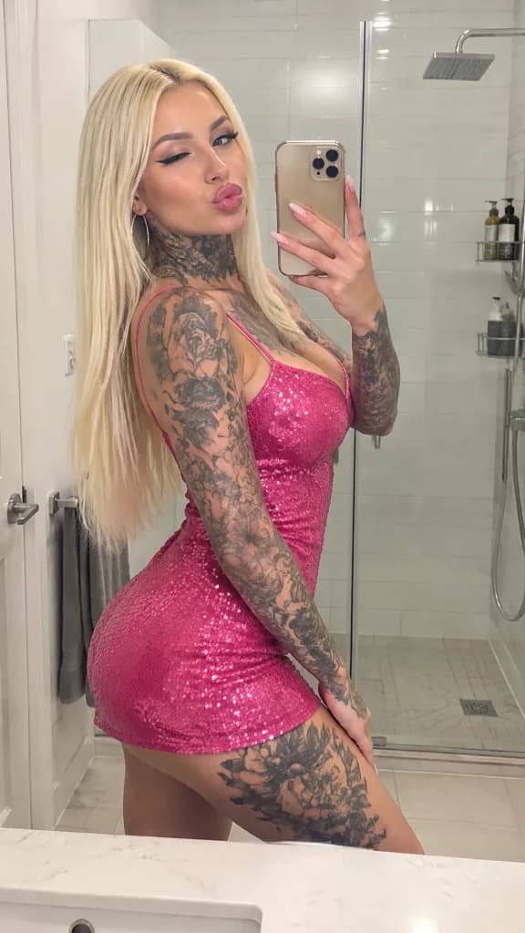Tattooed Woman Mirror Selfie in Sequin Dress