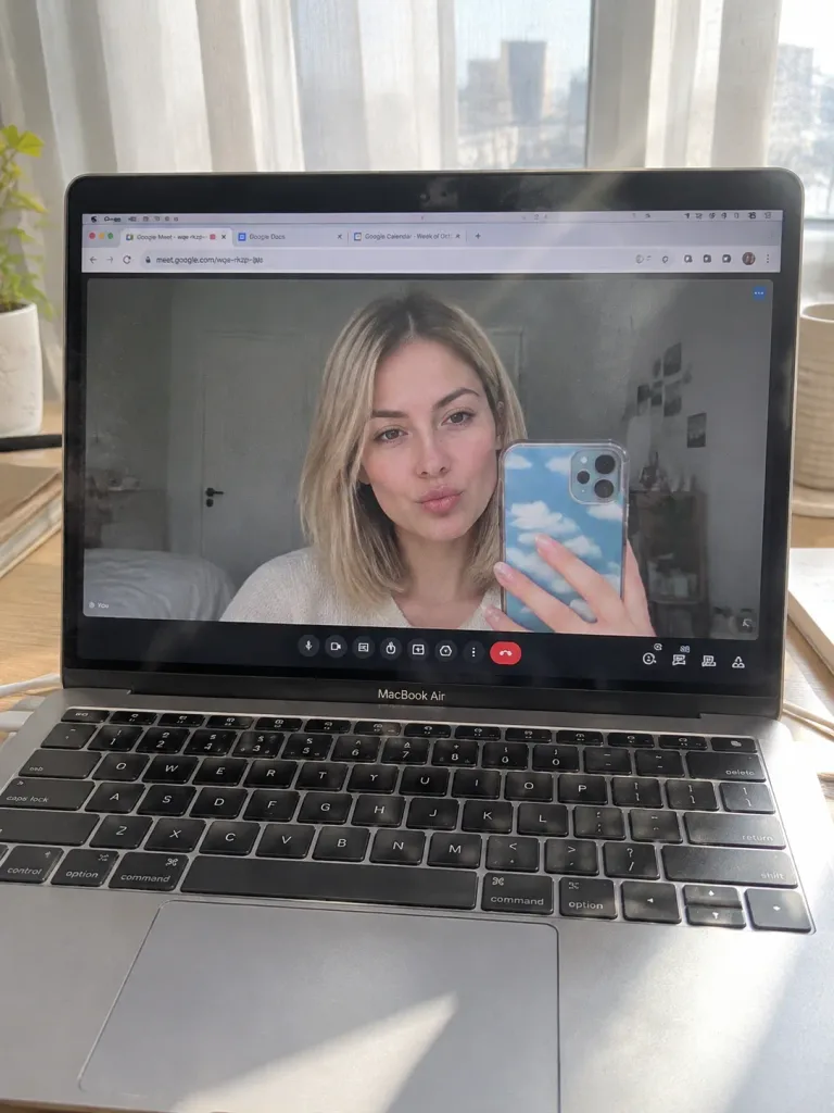MacBook Screen Displaying Google Meet Selfie